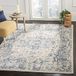 Safavieh Charleston Collectie CHL411A Decoratief tapijt, 1,2 x 1,8 m, ivoorkleurig en marineblauw, antiek oosters design, pluisvrij en onderhoudsvriendelijk, ideaal voor gebieden met veel verkeer