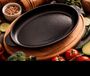 Ovale braadpan van fonte met plateau, 22 cm