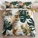 Or Housse de couette avec feuilles tropicales