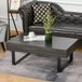MODFU Table basse avec tiroir et étagères ouvertes – panneau de particules gris foncé, cadre en acier noir, 110×60×40 cm
