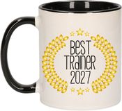 Bellatio Decorations Cadeau koffie/thee mok - de beste trainer van 2027 - zwart - 300 ml - keramiek