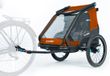CUBE Double CMPT-Trailer - Remorque enfant pour deux personnes - Remorque de vélo et poussette pour enfants en un - Remorque Kiddie résistante aux intempéries - Avec 70L d'espace de rangement - Gris/Orange