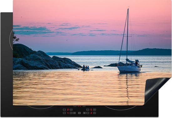 KitchenYeah® Inductie beschermer 77x51 cm - Roze en paarse lucht boven zeilschip - Inductie kookplaat accessoire