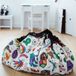 Play and Go OMY Color my bag tapis de jeu et sac de rangement