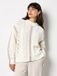 Apricot Trui met vetersluiting en pointelle-patroon