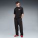 PUMA Essentials vierwegstretch relaxte broek met gestapeld effect voor Heren, Zwart, Maat L