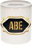 Bellatio Decorations Shoppartners Bv Spaarpot met voornaam Abe - wit - met goud/zwart embleem - 8 x 9 cm - keramiek - met afsluitdop - cadeau verjaardag