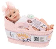 BABY born Real, poupée aux traits réalistes, fille. Peau claire, yeux ouverts, peint à la main. Modèle unique, aléatoire. Dès 3 ans. Incluant "Cuddle Key
