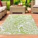 Tapis durable intérieur et extérieur avec un motif tropical vert, dimensions : 150 x 220 cm