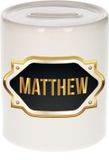 Bellatio Decorations Shoppartners Bv Spaarpot met voornaam Matthew - wit - met goud/zwart embleem - 8 x 9 cm - keramiek - met afsluitdop - cadeau verjaardag