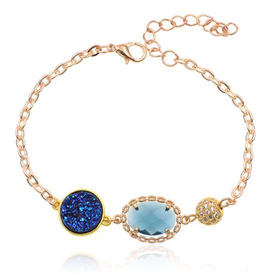 Deja Jewels Goudkleurige verstelbare dames armband met blauw glassteen