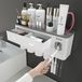 Porte-brosse à dents avec distributeur de dentifrice et 4 gobelets