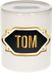 Bellatio Decorations Shoppartners Bv Spaarpot met voornaam Tom - wit - met goud/zwart embleem - 8 x 9 cm - keramiek - met afsluitdop - cadeau verjaardag