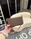 Michael Kors crossbody tas Bryant met logoprint donkerbruin